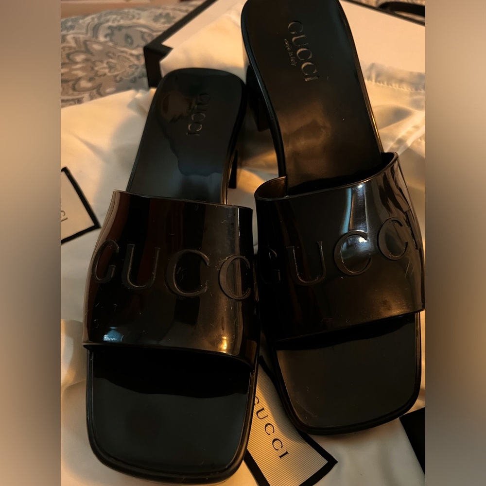 Gucci rubber slides.